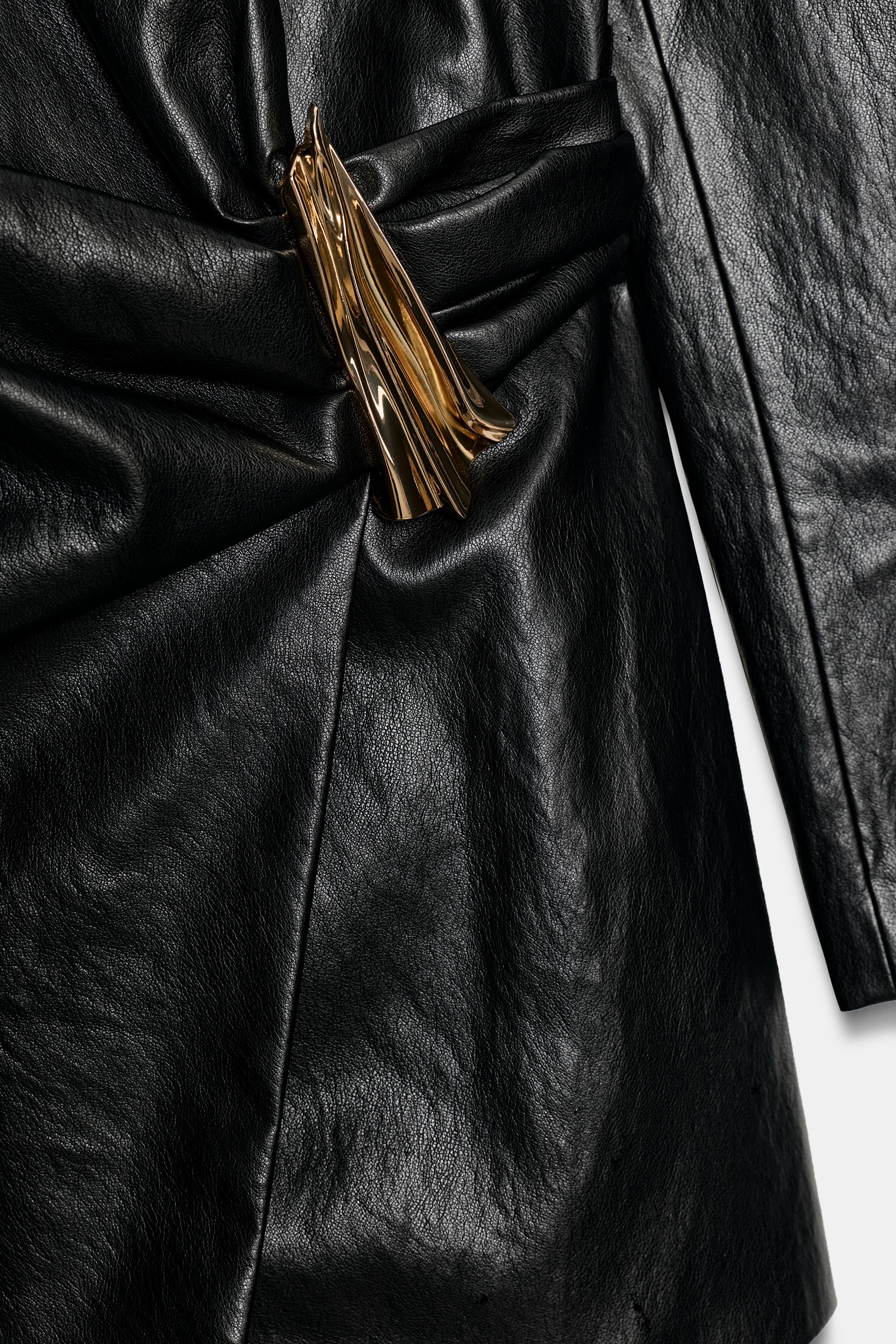 FAUX-LEATHER EFFECT DRESS WITH GOLD APPLIQUÉ